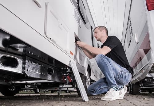 RV service professional with tools - Licensed from iStock